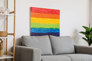 Poster - Painting of LGBT flag on sofa near light wall