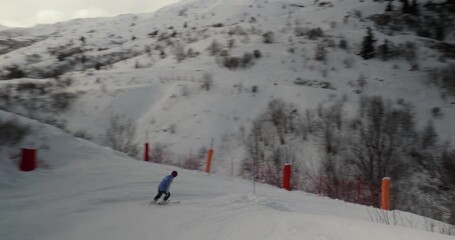 Wall Mural - skiing in the alps follow shot