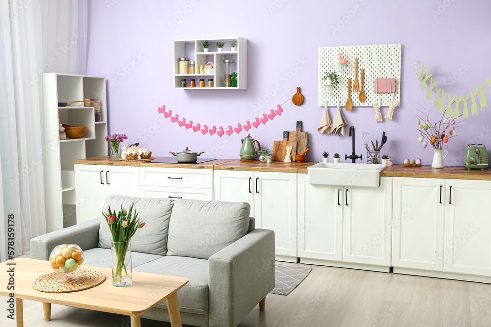Interior of modern kitchen decorated for Easter celebration