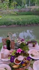 Wall Mural - A table with Thai Isaan countryside food in Thailand in the evening