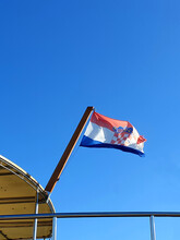 Croatian Flag  Tied To Mast On Boat Flying Against Clear Blue Sky With Space For Text