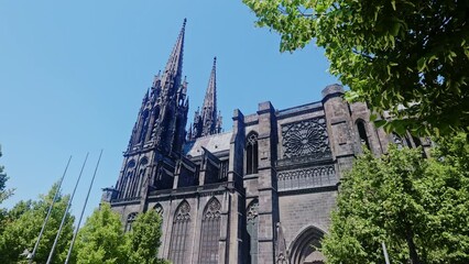 Wall Mural - Towering over Clermont-Ferrand city gothic cathedral Notre-Dame-de-l'Assomption building from black lava, France