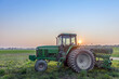 Farm Tractor in a field on a Maryland Farm at sunset