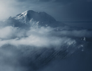 Wall Mural - mount rainier surrounded by mist in winter