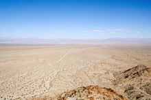 A Barren Desert Landscape In The Mojave.