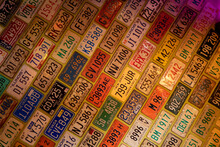 One Wall Is Completely Covered With Old American License Plates