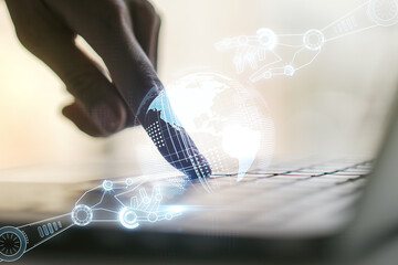 Aufkleber - Double exposure of robotics technology with world map hologram and hands typing on laptop on background. Research and development software concept
