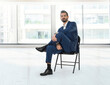 © Ramzi - Businessman sitting on chair in the office and thinking Full Length Portrait