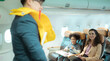© Wosunan - Flight attendants show how to use safety devices and recommend emergency exits.