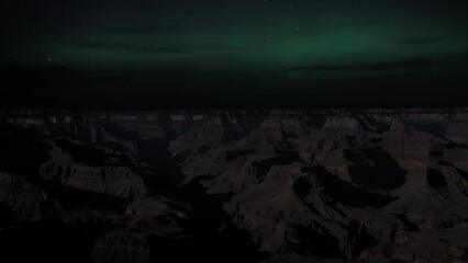 Wall Mural - Northern Lights (Aurora Borealis) are shining over the Grand Canyon. Time Lapse.