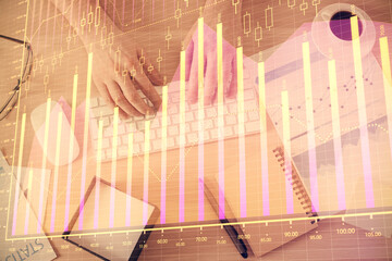 Poster - Multi exposure of man's hands typing over computer keyboard and forex graph hologram drawing. Top view. Financial markets concept.