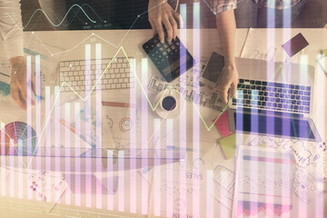 Aufkleber - Multi exposure of man and woman working together and financial chart hologram. Business concept. Computer background.