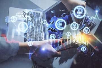 Poster - Double exposure of businesswoman hands typing on computer and financial graph hologram drawing. Stock market analysis concept.