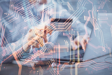 Fototapete - Double exposure of man hands holding a credit card and tech theme drawing. Technology in E-commerce concept.