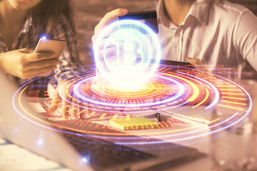 Aufkleber - Double exposure of man and woman on-line shopping holding a credit card and crypto theme hologram drawing. Blockchain and E-commerce pay on-line concept.