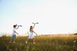 © Serhii - children play toy airplane. concept of happy childhood. children dream of flying and becoming a pilot.