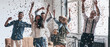 © gstockstudio - Happy young people dancing while spending time together with confetti flying around