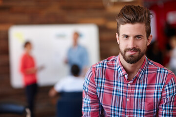 Aufkleber - His designs are as trendy as he is. Portrait of a young male designer in a casual work environment.