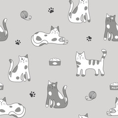 Wall Mural - Seamless pattern with cute cartoon cats on gray background.