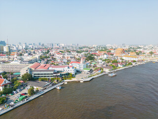 Wall Mural - Aerial view city of Bangkok riverside with building and buddha temple