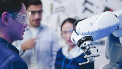 Wall Mural - Engineers Maintenance Robot Arm at Lab. he are in a High Tech Research Laboratory with Modern Equipment. Technology and Innovation ..