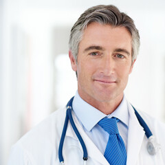 Poster - Im dedicated to my patients. Portrait of a doctor standing in an office.