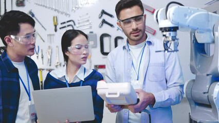 Wall Mural - Engineers Maintenance Robot Arm at Lab. he are in a High Tech Research Laboratory with Modern Equipment. Technology and Innovation ..