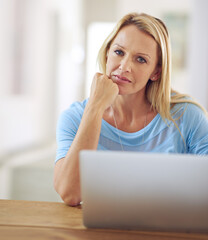 Poster - Just me and my laptop today. Portrait of a mature woman using a laptop at home.