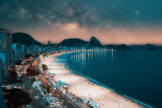 panoramic aerial view at night to copacabana beach and buildings in rio de janeiro under the stars a