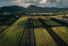 Aerial View Of The Runway And Plane Hangars Of Lihue Airport On Kauai Island, Hawaii, United States - Sep 2022