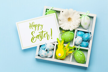 Wall Mural - Easter greeting card with flowers and easter eggs