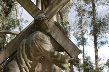 Wall Mural - viacrucis station number two jesus carries the cross, heavier for the sins of the world