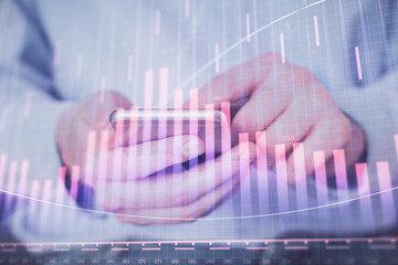 Aufkleber - Double exposure of man's hands holding and using a digital device and forex graph drawing. Financial market concept.