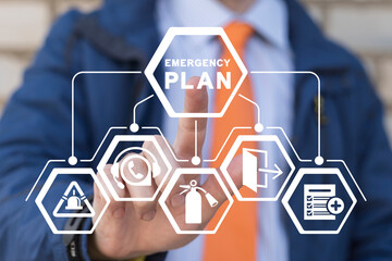 man using virtual touchscreen presses inscription: emergency plan. concept of emergency preparedness