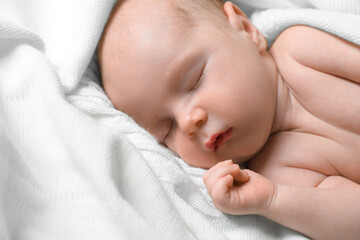 Wall Mural - Cute newborn baby sleeping on white blanket, closeup