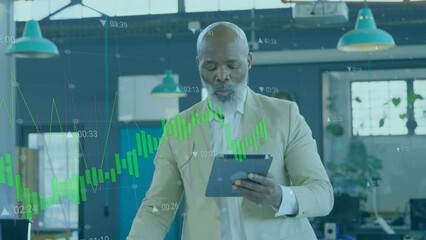 Sticker - Animation of data processing over african american senior businessman using digital tablet at office