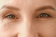 Mature woman with brown eyes, closeup