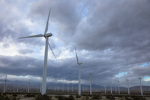 Heavy Clouds Over A Large Windmill Farm Near Palm Springs California At Sunset