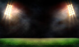 Fototapeta Sport - Green soccer field, bright spotlights,	
