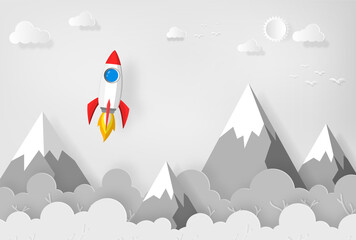 Wall Mural - space rocket launch to the sky, mountains, trees and clouds on background. vector paper art or paper cut concept