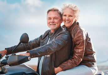 Travel, motorcycle and portrait of senior couple on road trip, adventure and enjoy freedom in retirement. Smile, traveling and happy man and woman ride on motorbike for holiday, vacation and journey