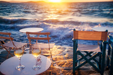 Romantic Evening On The Beach With Two Glasses Of Wine