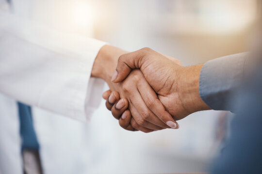 doctor, patient and handshake in hospital thank you, welcome or greeting for medicine trust, help or