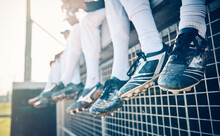 Baseball Feet, Team And Sport Field Stadium For Fitness, Workout And Game Exercise. Softball Shoes, Sports Group And Summer Outdoor With People Sitting On An Athlete Training Break Together