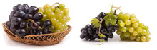 Bunch Of Green And Blue Grapes In Wicker Basket Isolated On White Background