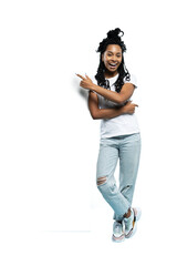 Sticker - Full length image of young brunette woman wearing casual clothes smiling and pointing finger at copyspace isolated on a transparent background