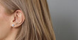 © oz - close-up of woman hair and ear