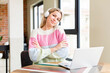 © kues1 - pretty young woman working at home with a laptop. house interior design