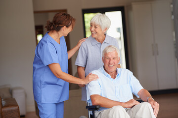 Sticker - Hell be on his feet in no time. a nurse giving good news to her senior patient and his wife.