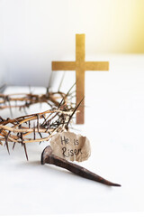 Poster - He is Risen. Jesus Crown Thorns and nails and cross on a white background. Crucifixion Of Jesus Christ. Passion Of Jesus Christ. Concept for faith, spirituality and religion. Easter Day